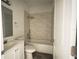 Clean bathroom with a bathtub, toilet and vanity at 431 Rainbow Ct, Kissimmee, FL 34759