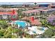 Aerial view of 5012 Shoreway Loop #102 with pool, clubhouse, and nearby attractions like the ICON Park ferris wheel at 5012 Shoreway Loop # 10207, Orlando, FL 32819