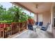 Private patio with seating area and lush tropical plants at 5012 Shoreway Loop # 10207, Orlando, FL 32819