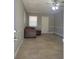 Spacious living room with tile flooring and a ceiling fan at 701 Titcomb St, Eustis, FL 32726