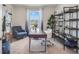 Home office with a desk, chair, bookshelf, and stylish decor at 7092 Painted Bunting Way, St Cloud, FL 34773