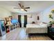 Spacious bedroom with a king-size bed and plenty of natural light at 7211 Pinion Dr, Orlando, FL 32818