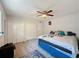 Spacious bedroom featuring a king-size bed and large closets at 7211 Pinion Dr, Orlando, FL 32818