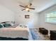 Bright bedroom with a king-size bed and ample closet space at 7211 Pinion Dr, Orlando, FL 32818