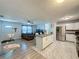 Modern kitchen with stainless steel appliances and an island at 7211 Pinion Dr, Orlando, FL 32818