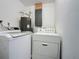 Functional laundry room, complete with washer and dryer at 7211 Pinion Dr, Orlando, FL 32818