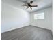 Well-lit bedroom with ceiling fan and window at 767 Trailwood Dr, Altamonte Springs, FL 32714