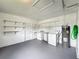 Clean and spacious garage with built-in shelving at 767 Trailwood Dr, Altamonte Springs, FL 32714