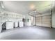 Bright garage with washer, dryer, and ample storage at 767 Trailwood Dr, Altamonte Springs, FL 32714