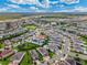 Aerial view of a residential community with houses, pools, and green spaces at 7723 Graben St, Kissimmee, FL 34747