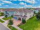 Stunning aerial view of a two story house and neighborhood at 7723 Graben St, Kissimmee, FL 34747