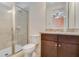 Bathroom with single vanity and shower at 7723 Graben St, Kissimmee, FL 34747