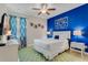 Bedroom with a queen-size bed and en-suite bathroom at 7723 Graben St, Kissimmee, FL 34747