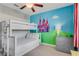 bedroom with castle mural and bunk beds at 7723 Graben St, Kissimmee, FL 34747