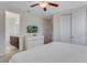 Bedroom with a king-size bed and en-suite bathroom at 7723 Graben St, Kissimmee, FL 34747