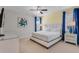 Bedroom with a king-size bed and en-suite bathroom at 7723 Graben St, Kissimmee, FL 34747