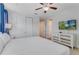 Bedroom with a queen-size bed and en-suite bathroom at 7723 Graben St, Kissimmee, FL 34747