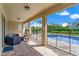 Covered patio overlooking the pool and spa at 7723 Graben St, Kissimmee, FL 34747