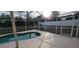 Inviting screened pool with backyard view at 7808 Rollingridge Ct, Orlando, FL 32835