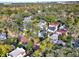 Aerial view of house and surrounding neighborhood at 833 Ellwood Ave, Orlando, FL 32804