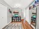 Bright hallway with hardwood floors and built-in storage at 833 Ellwood Ave, Orlando, FL 32804