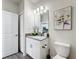 Bathroom showcasing vanity with modern fixtures and decor in neutral tones at 8886 Fallen Oak Dr, Davenport, FL 33896