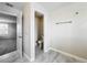 Bathroom featuring a door to the toilet and nice flooring at 8886 Fallen Oak Dr, Davenport, FL 33896