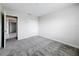 Bedroom with a door to another room and a closet at 8886 Fallen Oak Dr, Davenport, FL 33896