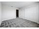 Bedroom with a door to another room and a large closet at 8886 Fallen Oak Dr, Davenport, FL 33896