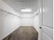 Spacious walk-in closet with carpet floors and wire shelving at 8886 Fallen Oak Dr, Davenport, FL 33896