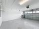 This garage offers painted walls and flooring at 8886 Fallen Oak Dr, Davenport, FL 33896