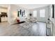 Inviting living room with neutral decor, stylish furniture, a decorative rug, and plenty of natural light at 8886 Fallen Oak Dr, Davenport, FL 33896
