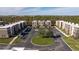 Complex of modern townhomes with parking and green space at 9029 Ibiza Ln # 1, Kissimmee, FL 34747