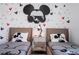 Mickey Mouse themed bedroom with two twin beds at 9029 Ibiza Ln # 1, Kissimmee, FL 34747