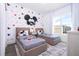 Mickey Mouse themed bedroom with two twin beds at 9029 Ibiza Ln # 1, Kissimmee, FL 34747