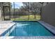 Private screened-in pool with paver deck at 9029 Ibiza Ln # 1, Kissimmee, FL 34747