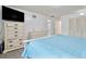 Spacious bedroom with large dresser and ensuite bathroom at 905 Suwannee Dr, Apopka, FL 32703