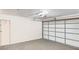 Attached garage with automatic door opener and extra storage at 905 Suwannee Dr, Apopka, FL 32703