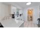 Modern kitchen with white cabinets and quartz countertops at 905 Suwannee Dr, Apopka, FL 32703