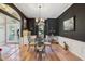 Elegant dining room with hardwood floors and a chandelier at 10 Broadwater Dr, Ormond Beach, FL 32174