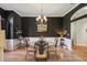 Elegant dining room with hardwood floors and a chandelier at 10 Broadwater Dr, Ormond Beach, FL 32174