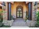 Elegant entryway with stone pillars and double doors at 10 Broadwater Dr, Ormond Beach, FL 32174