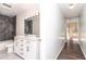 Modern bathroom with double vanity and marble countertop at 11431 Nw 100Th St, Ocala, FL 34482