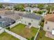 Aerial view of two-story house, backyard, and neighborhood at 1255 Blackwater Pond Dr, Orlando, FL 32828