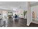 Dining area with dark hardwood floors, a round table, and six chairs at 1255 Blackwater Pond Dr, Orlando, FL 32828