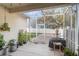 Relaxing screened patio with space for grilling and outdoor furniture at 14087 Bradbury Rd, Orlando, FL 32828