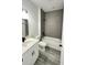 Bathroom featuring a bathtub, toilet and grey flooring at 14511 Sw 29Th Ter, Ocala, FL 34473