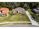 Single-story house on a corner lot with a large yard and driveway at 1458 Foxtail Dr, Lake Mary, FL 32746