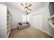 Spacious bedroom with built-in shelving and sofa at 1458 Foxtail Dr, Lake Mary, FL 32746