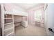 Charming bedroom with a built-in loft bed, desk, and plenty of storage at 1458 Foxtail Dr, Lake Mary, FL 32746